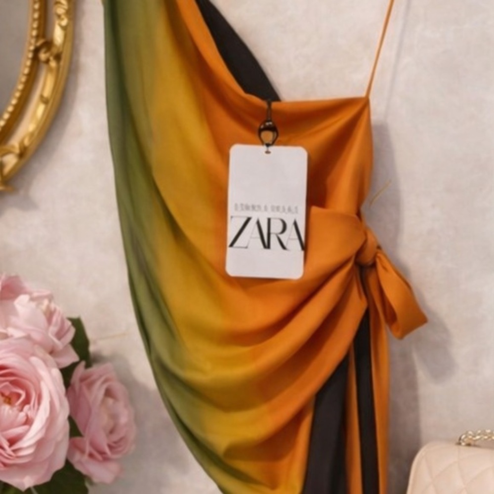 Zara Asymmetrical Sunset Top”
Never Worn • Resort Glam